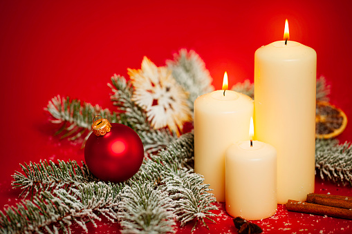 Christmas decoration with candle and food.