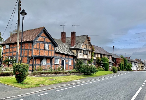 A row of historic residential houses dating from the 16th century in Pembridge, Herefordshire, UK.