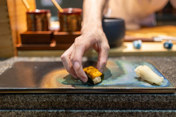 istock Chef is making Japanese Omakase in the restaurant 1820497522