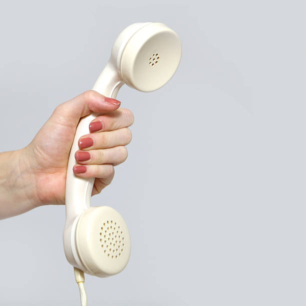 istock Hand holding a retro phone 182050210