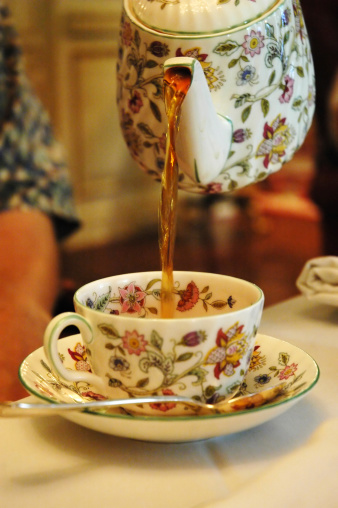 Pouring a cup for High Tea