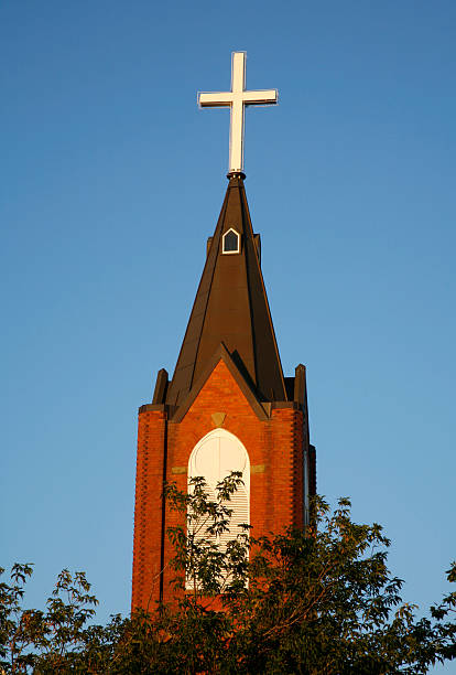 istock Catholic Church Steeple And Cross 182050514