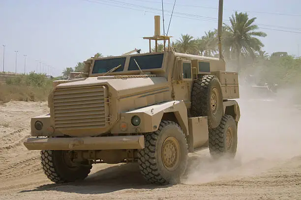 A Specialized anti-IED U.S. truck goes on patrol.