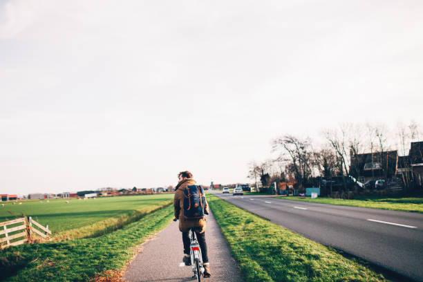 istock Man using bicycle to commute from suburbs to the city 1820511472
