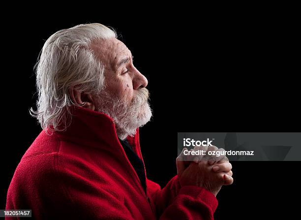 Praying Old Man Stock Photo - Download Image Now - Aspirations, Black Background, Men