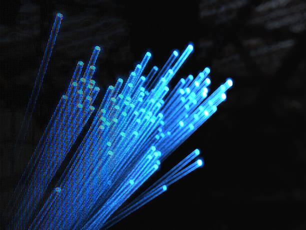 istock Blue fiber optics against a black background 182052027
