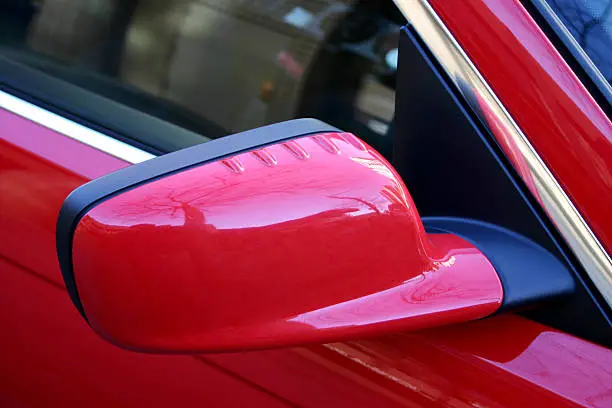 closeup photo of a BMW rear mirror