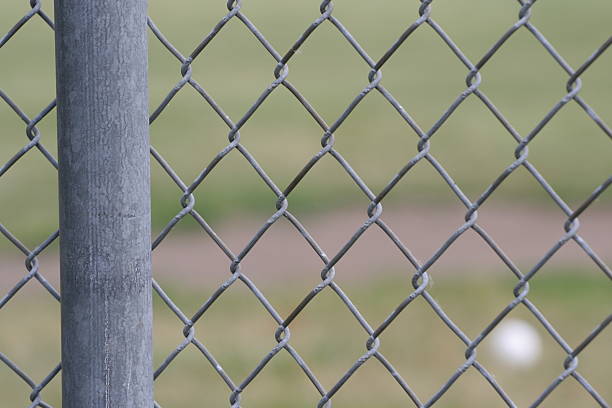 istock metal chain-link fence 182053029