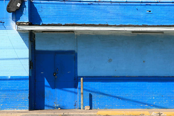 istock Stark, blue wall and doors. 182053282