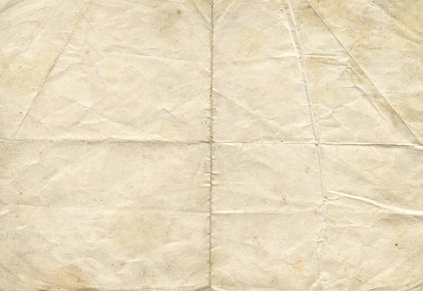 Distressed antique paper Folded paper for composition design or displacement maps into Photoshop.Please view more grunge paper backgrounds. wrinkled stock pictures, royalty-free photos & images