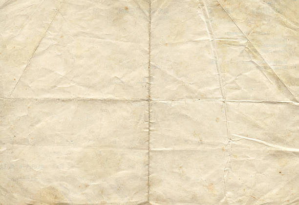 Distressed antique paper Folded paper for composition design or displacement maps into Photoshop.Please view more grunge paper backgrounds. run down stock pictures, royalty-free photos & images