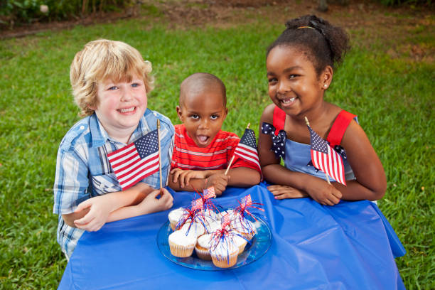 istock July 4th or Memorial Day picnic celebration 182053869