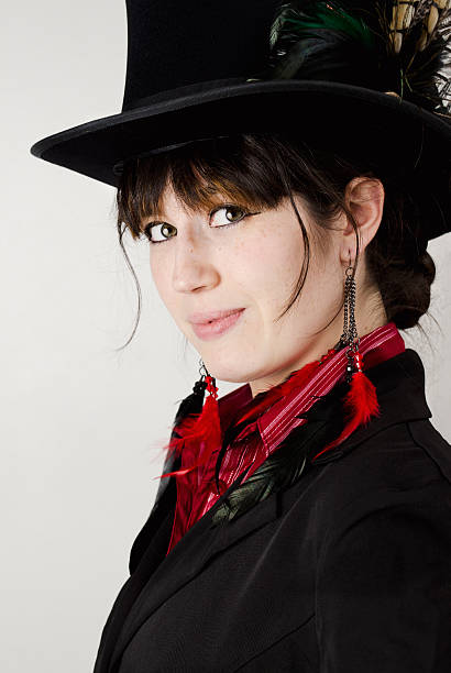 istock Pretty Brunette with a Top Hat and Feathers II 182053894