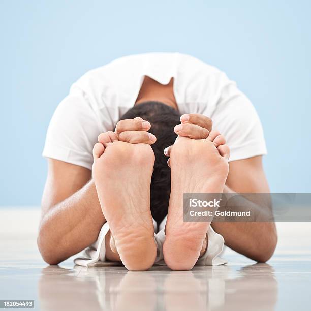 Yoga Paschimottanasana Stock Photo - Download Image Now - 40-49 Years, Adult, Adults Only