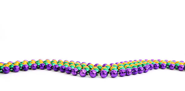 Mardi Gras Beads with focus on the center bead.