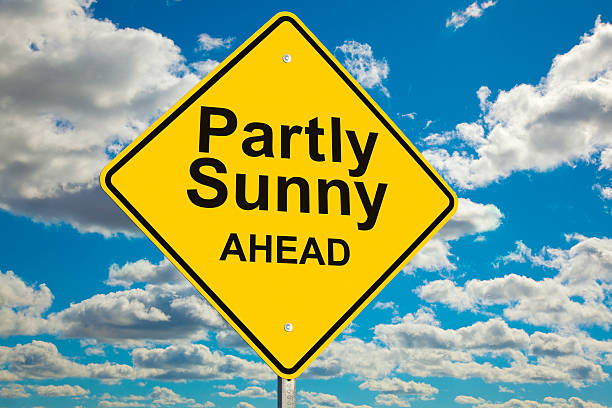 istock Partly Sunny Ahead Road Sign 182054747