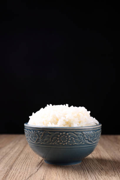 istock Thai rice isolated on wood background 1820557198