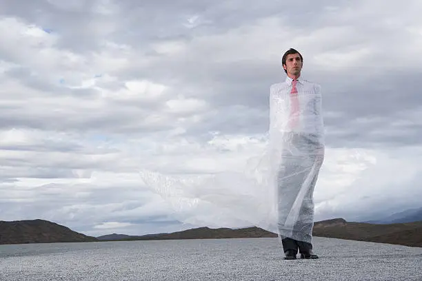 Photo of Man outdoors ensnared in a sheer sheet