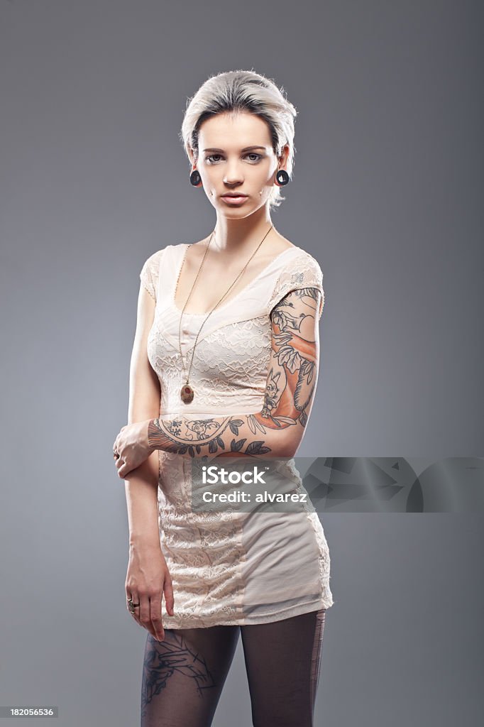 Portrait of a young tattooed woman Women Stock Photo