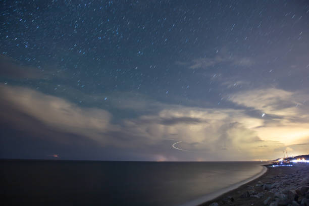 istock Night sky over by the sea with lightning. 1820566272