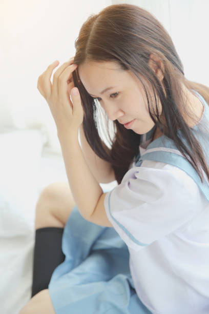 istock School girl on white room 1820576749
