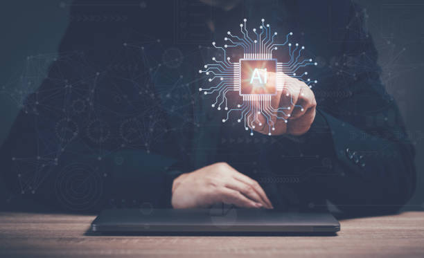 istock Ai, the concept of artificial intelligence use analytics for big data. Man press to the AI icon in virtual screen. AI is the future technology use for development information innovation network. 1820578912