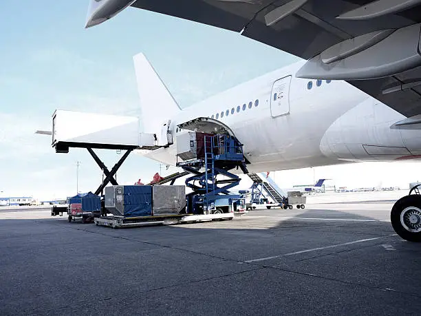 Passenger Plane being loaded.