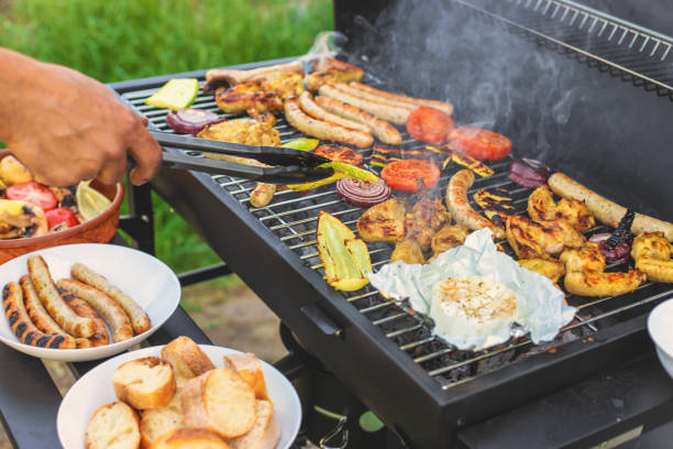 Grill sausages and vegetables. Selective focus.