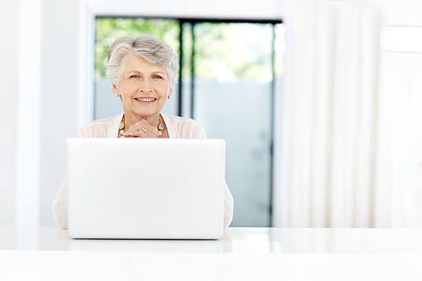 istock Modern senior woman keeping on top of her admin 182058143