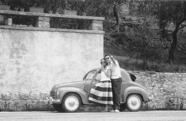 Young Couple and Vintage Car.