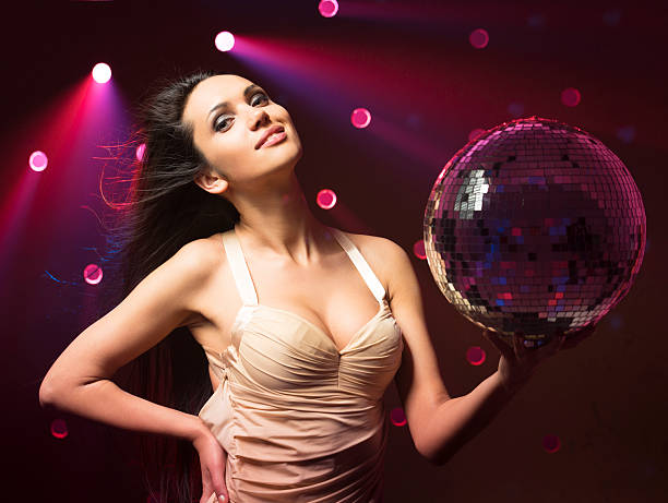 istock Sensual women portrait in disco light 182058421