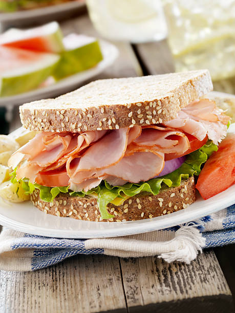 istock Ham and Cheese Sandwich at a Picnic 182058456