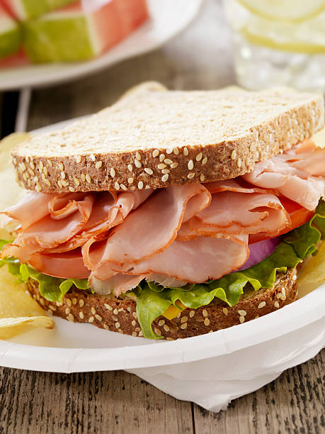 istock Ham and Cheese Sandwich at a Picnic 182058519