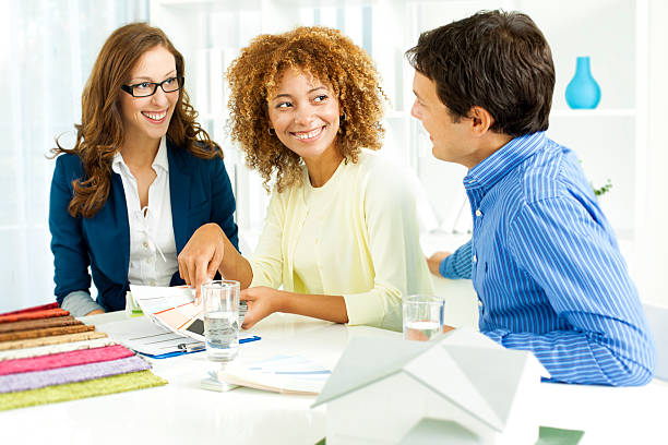 istock Couple Meeting with Interior Designer 182058645