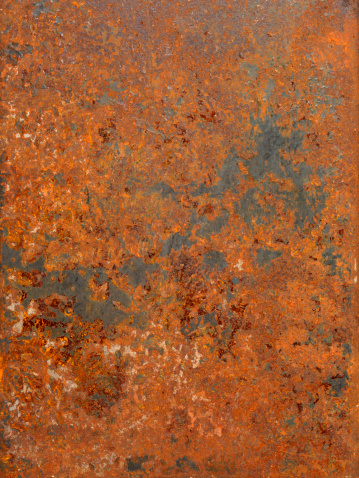 Its rusted tin roof made it seem abstract because of its irregular rust