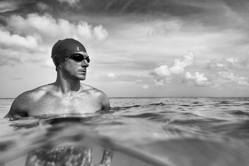 Black and white picture of a swimmer with added grain for effect.