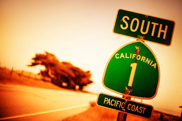 pacific coast highway road sign - california highway 1 stock-fotos und bilder