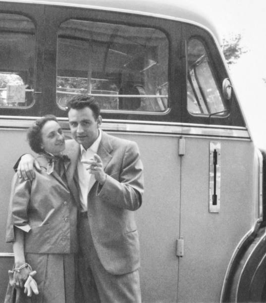 istock Young Couple and Vintage Coach. 1820594487
