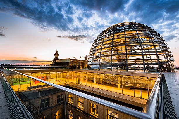 The Reichstag Dome,Berlin Outside the illuminated Reichstag Dome at Twilight. Spiral walkways to the top of the Reichstag, Germany's parliament building in the heart of Berlin, Central Berlin, Germany. the reichstag stock pictures, royalty-free photos & images