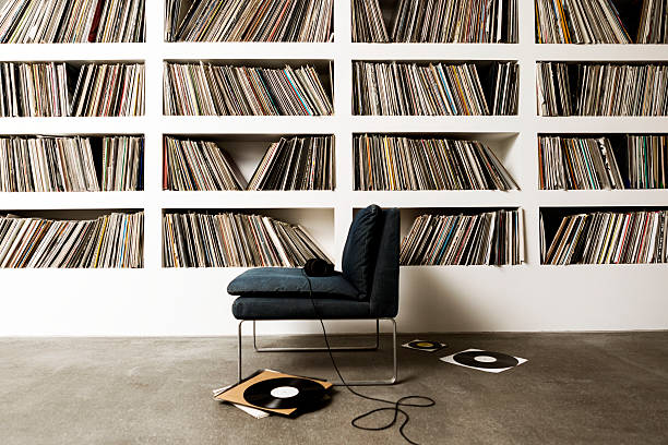 Vinyl Records A collection of vinyl records on shelfs. audio equipment photos stock pictures, royalty-free photos & images