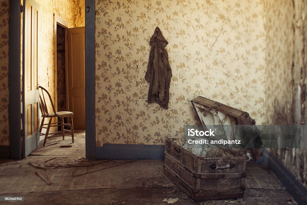 Abandoned house "A rickety old chest and chair in an abandoned house in the old gold mining town of Bodie, California." Bodie Ghost Town Stock Photo
