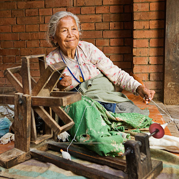 Nepali woman spinning the wool. Bhaktapur