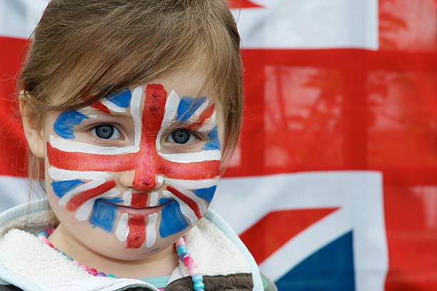 Girl with Union Jack flag face painting stock photo