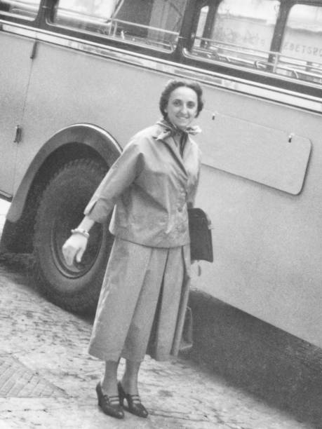 istock Young Woman and Vintage Coach. 1820608057