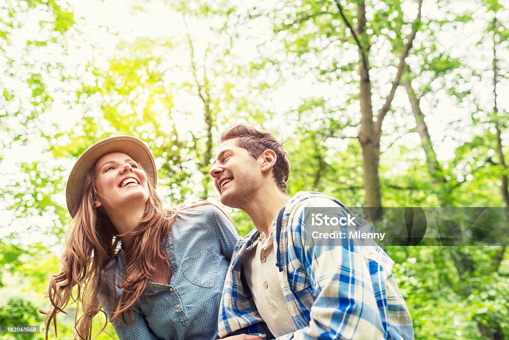 Couple Having Fun in Nature Summer Love Joyful, young couple joking, having fun outdoors in green nature. summer love lifestyle Fun Stock Photo