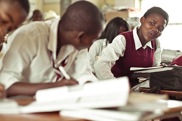istock South African teenagers flirting in class 182061599