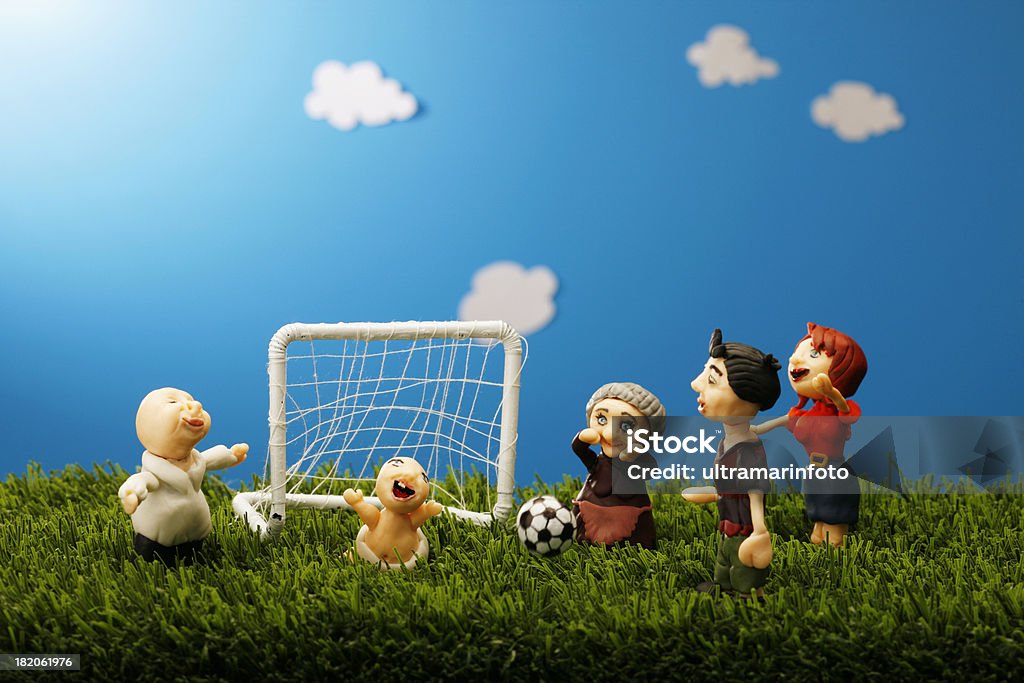 Famiglia tempo di calcio - Foto stock royalty-free di Adulto