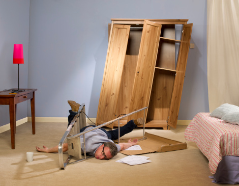 man makes a mess of his self assembly wardrobe then falls off his ladder