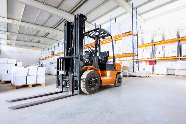 Warehouse forklift in warehouse. forklift photos stock pictures, royalty-free photos & images