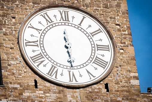 Close up view of Palazzo Vecchio ancient clock. Vignette added for the vintage mood.